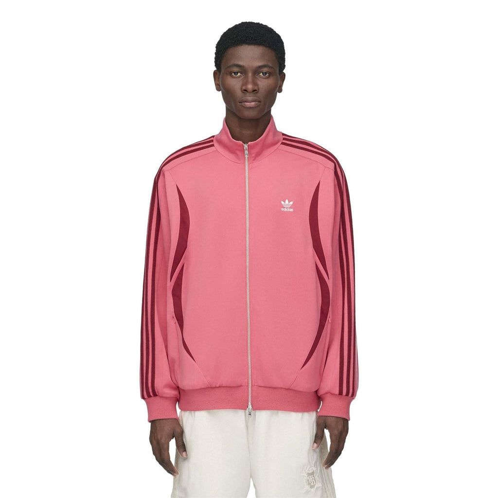 Pink track top with stand collar, full zipper, and small adidas logo on chest