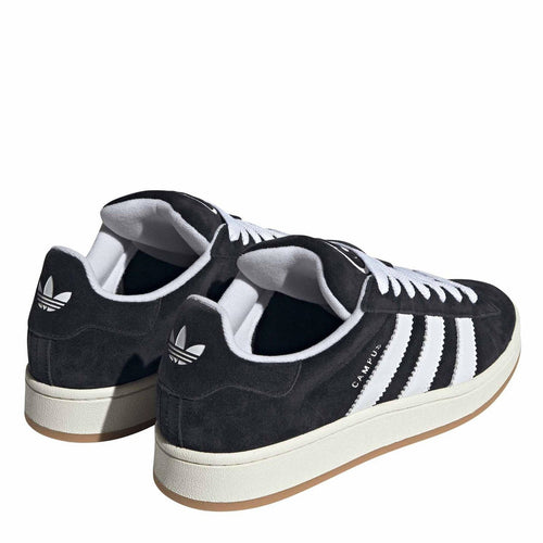 Black suede adidas Originals sneakers, heel view with white lining and lace-up closure