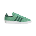 Green adidas Originals low-top trainers with lace-up suede upper and three-bar stripes