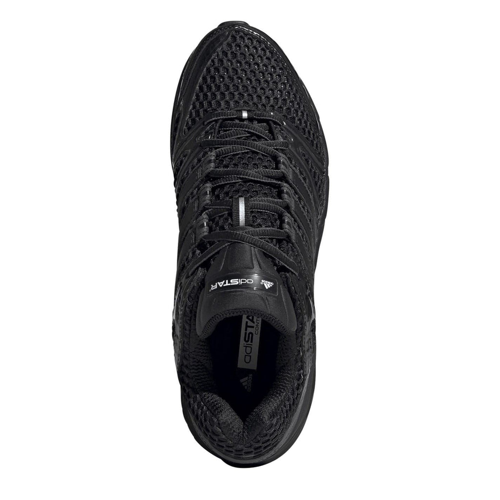 Black lace-up sneaker front view with mesh panels and rubber logo details