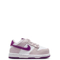 Toddler Nike Dunk Low sneakers in white and pale pink with violet accents