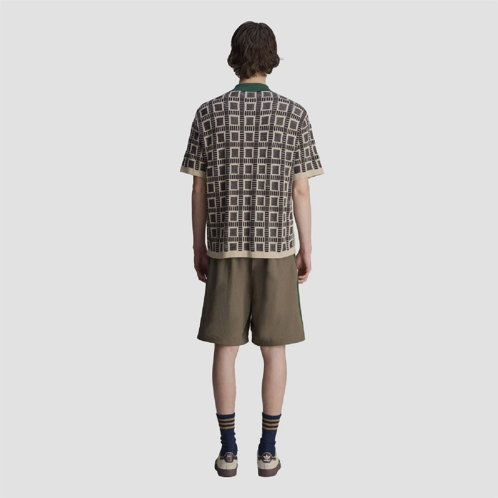 adidas Originals polo shirt back view with geometric pattern and green collar trim