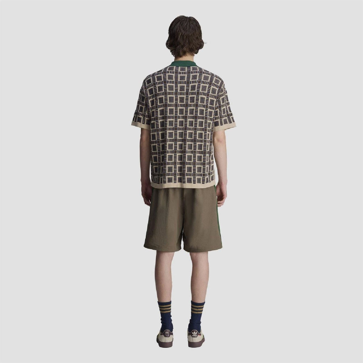 adidas Originals polo shirt back view with geometric pattern and green collar trim