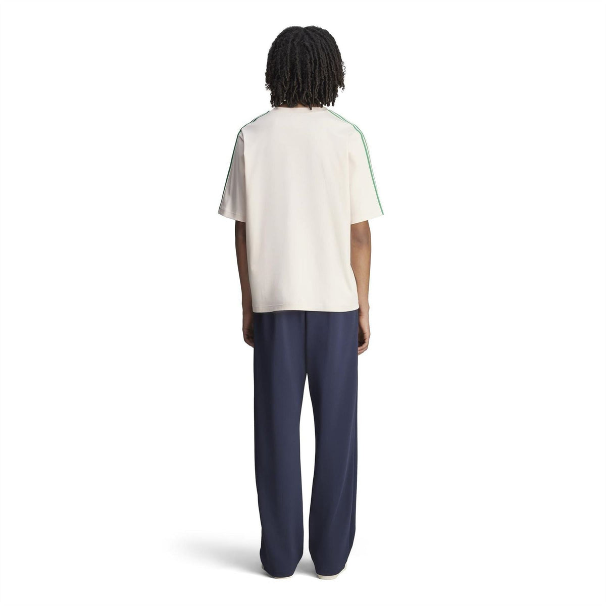 Cream logo T-shirt with green sleeve stripes, back view on model