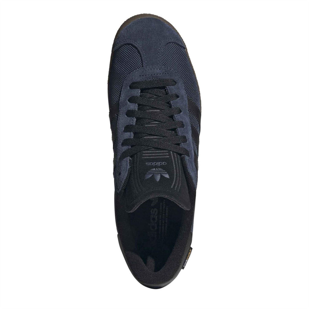 Gazelle OG lace-up sneakers with perforated toe, navy upper, lace-up front, brown sole