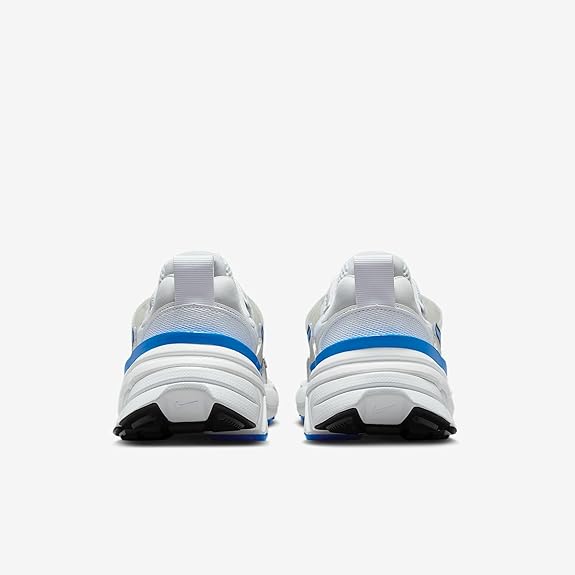 Women's Nike V2K Run sneakers heel view, white with blue trim and black tread