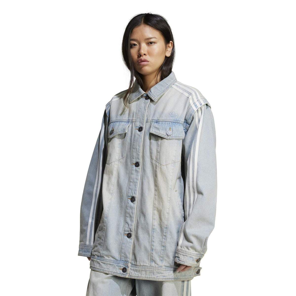 adidas Originals light denim collared jacket with vertical side stripes and flap chest pockets