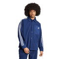 Indigo adidas fleece track shirt with button front, stand collar, and white three-stripe sleeves