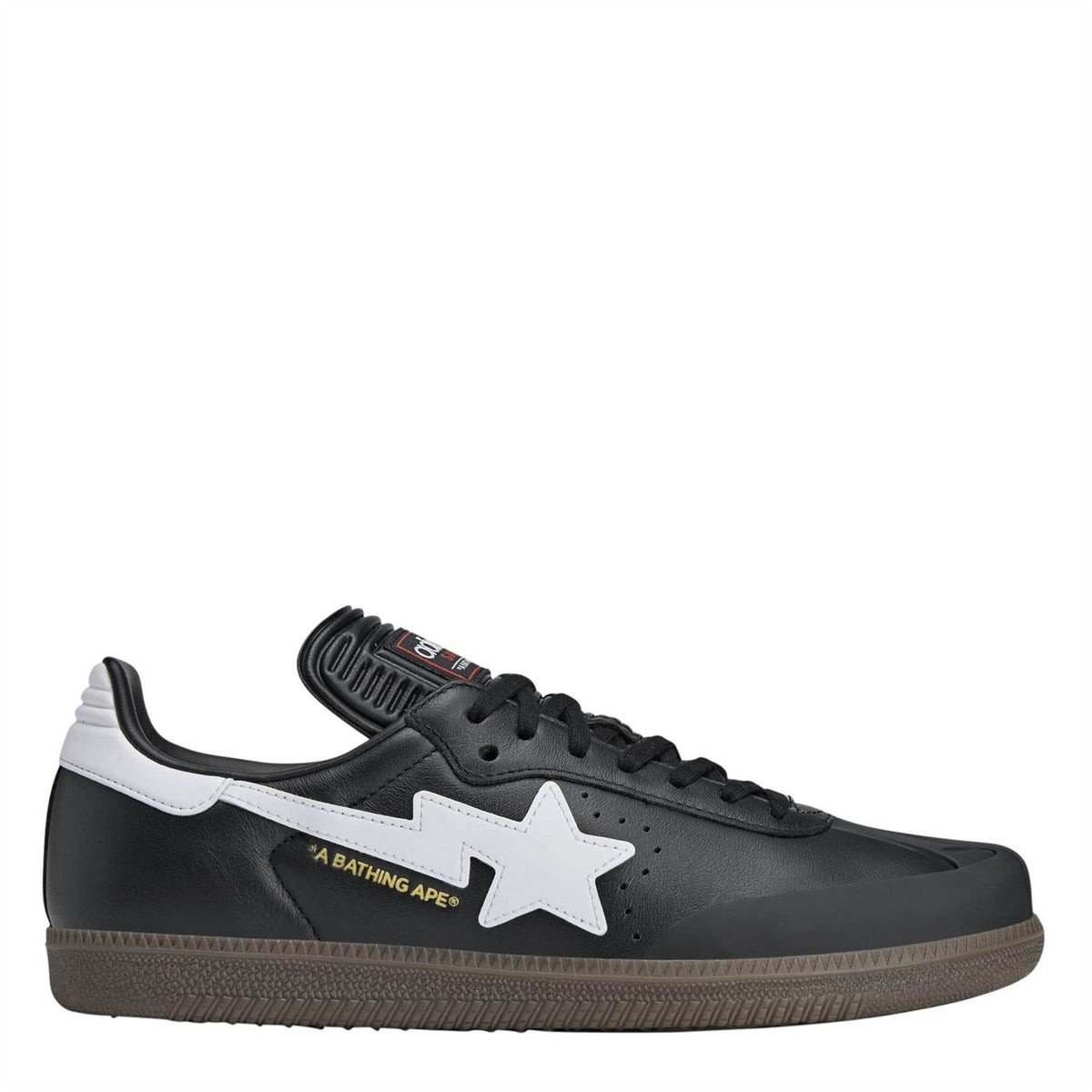 Black and white low-top sneakers with white star logo and lace-up front