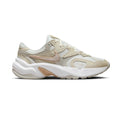 Nike women's running sneakers, light bone with tan accents, white chunky sole