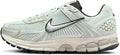 Women's Nike Zoom Vomero 5 running shoes in light silver with black swoosh, lace-up.
