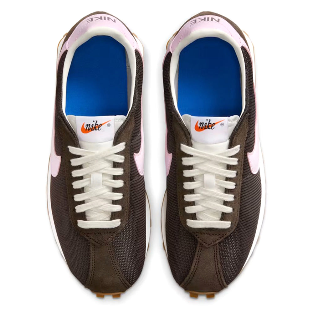 Women's Nike sneakers with blue interior, white laces, brown upper and pink accents