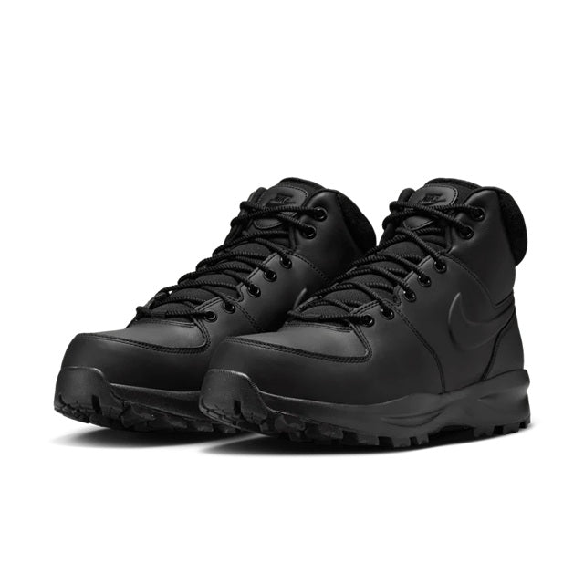 Pair of men's Nike black leather lace-up boots, front view with chunky sole