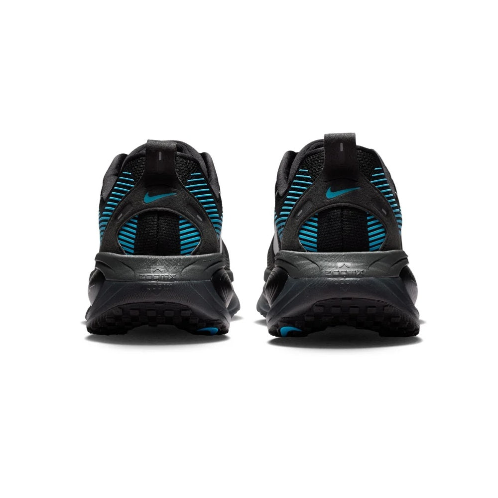 Men's running shoes heel view showing black cushioning with light blue accent stripes