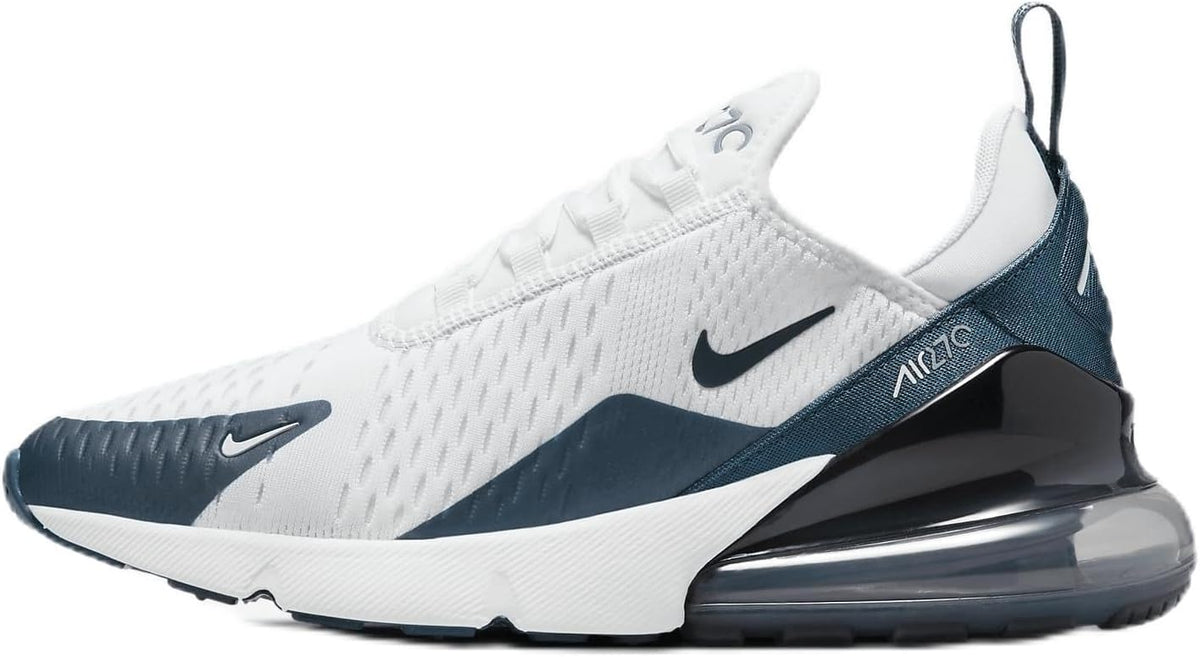 Women’s Nike Air Max 270 sneakers with white knit upper, blue accents, swoosh, and visible Air unit