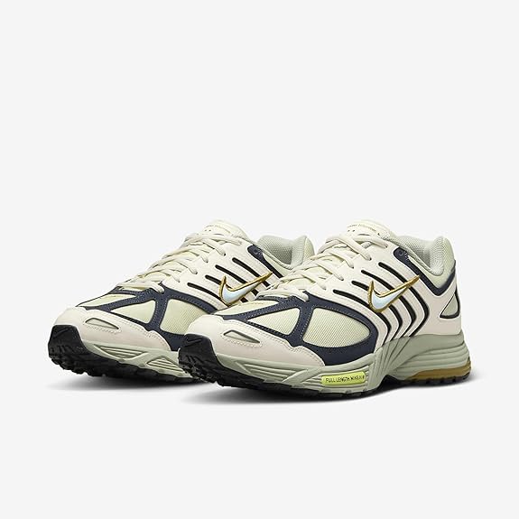 Men's Nike Pegasus 2005 shoes: lace-up, navy overlays, olive heel, cream toe