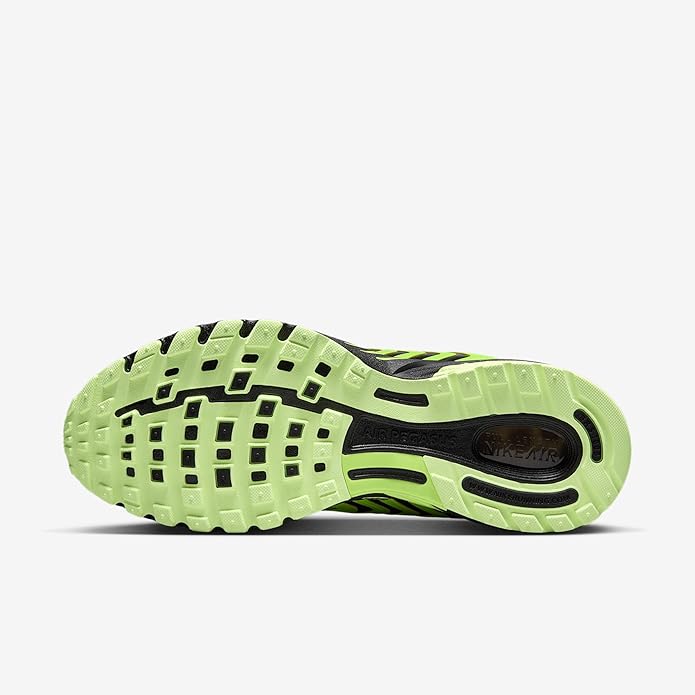 Outsole view of volt green and black running sneakers with traction tread pattern