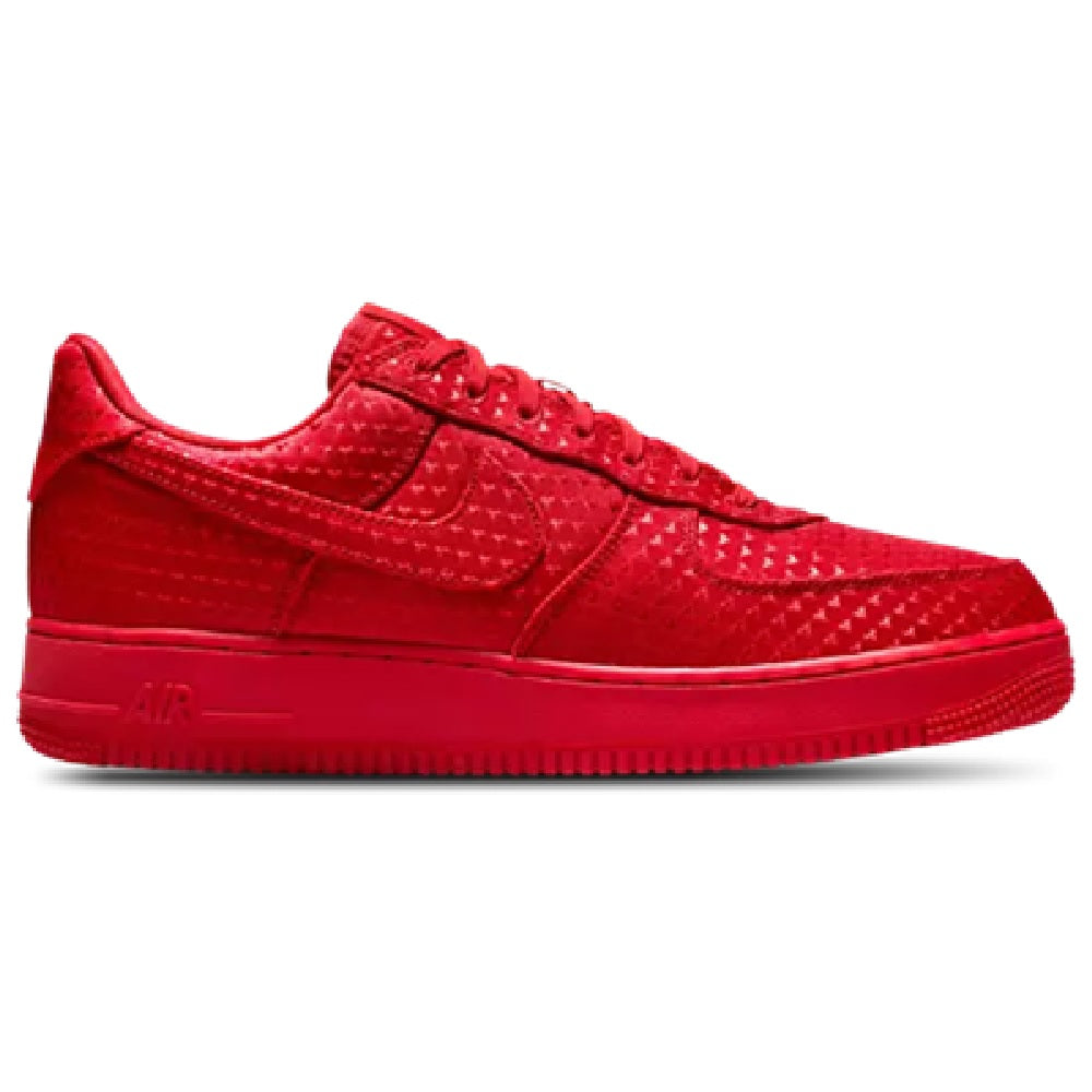 Red Nike Air Force 1 low-top sneakers with swoosh and lace-up eyelets