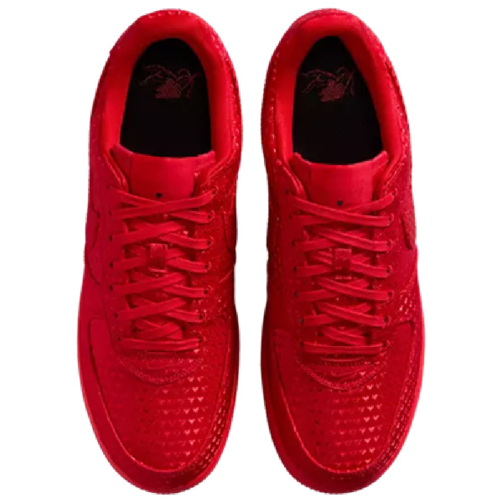 Red Nike Air Force 1 sneakers with lace-up front and textured toe box