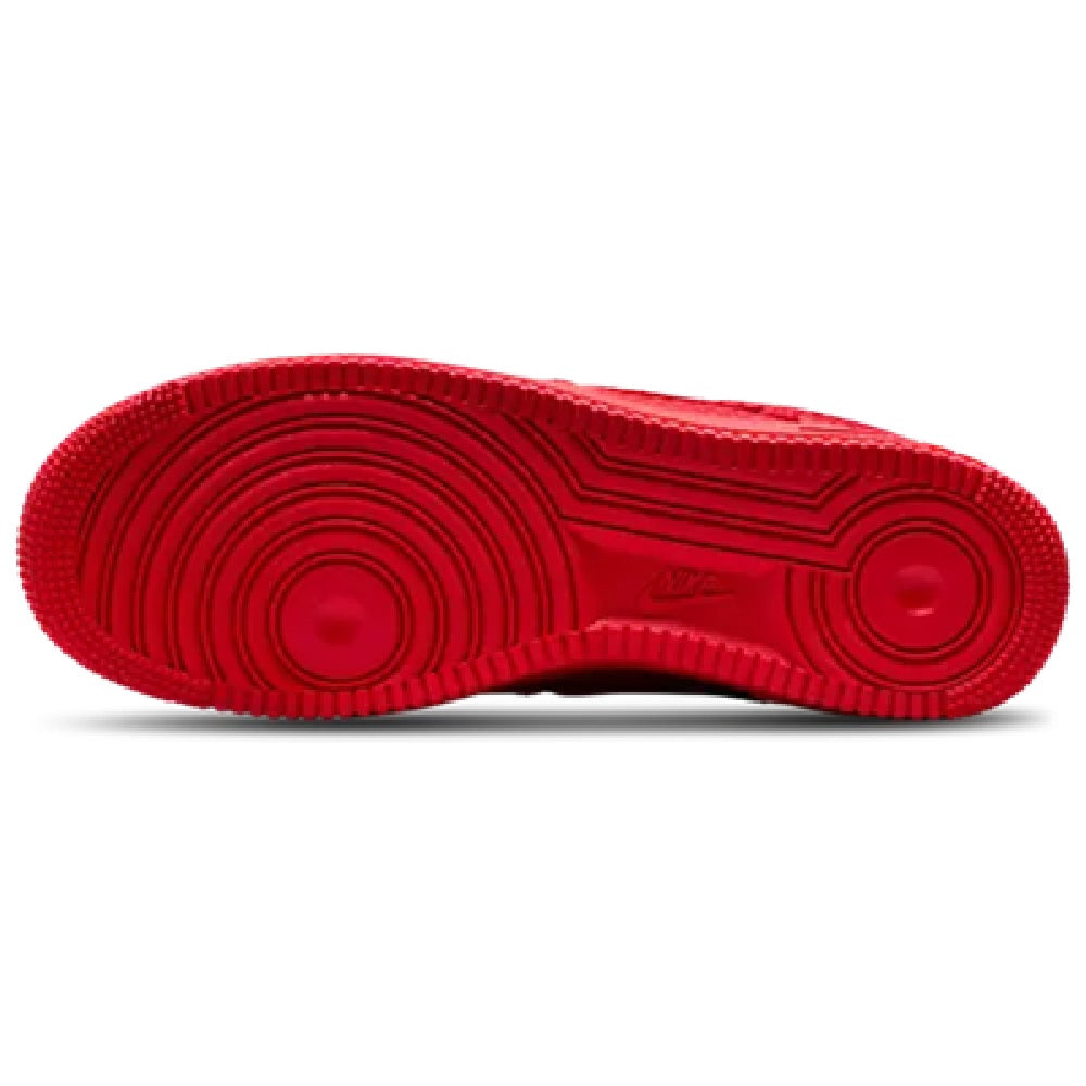 Red Nike Air Force 1 outsole with circular traction grooves