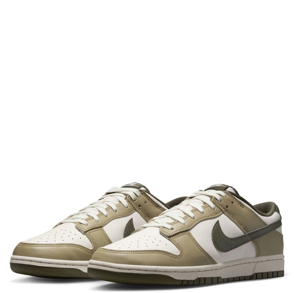 Nike Dunk Low sneakers pair view with white toe box, olive overlays, and laces
