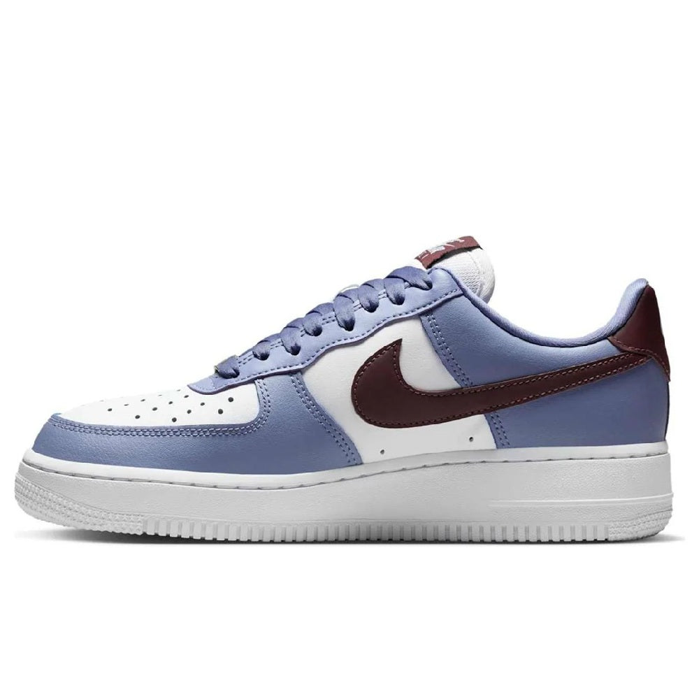 Low-top Air Force 1 sneakers in light blue with white panels and burgundy accents