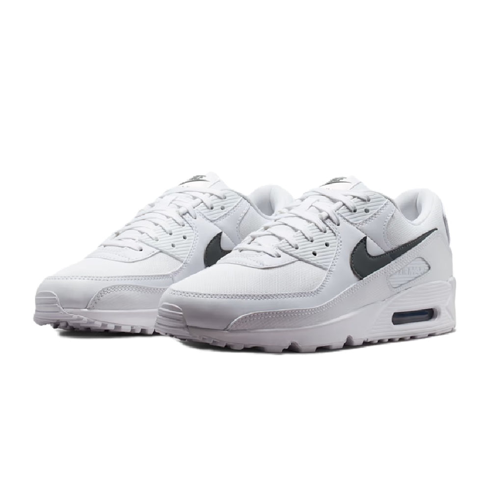 Pair of white lace-up sneakers with gray overlays and black swoosh, Air Max unit.
