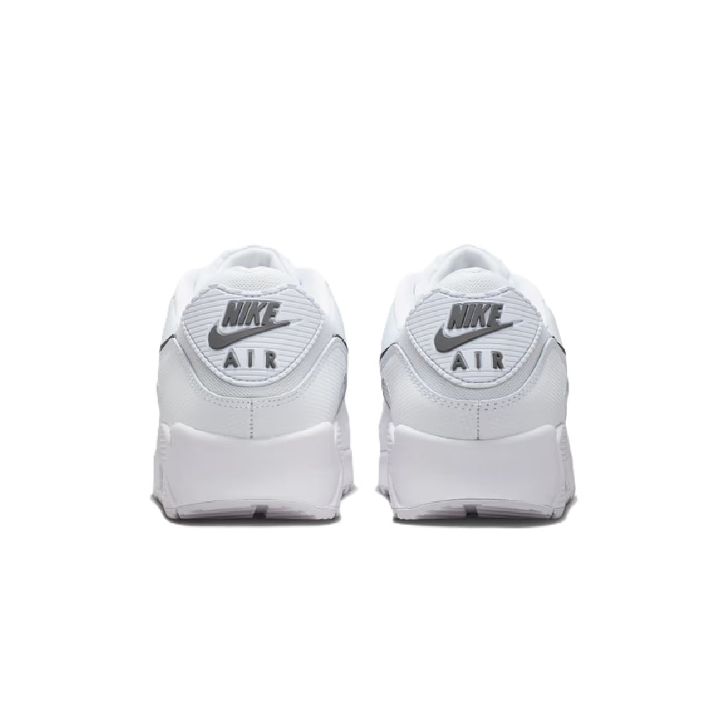 White heel of Nike Air sneaker with 'NIKE AIR' logo on the back, padded collar.
