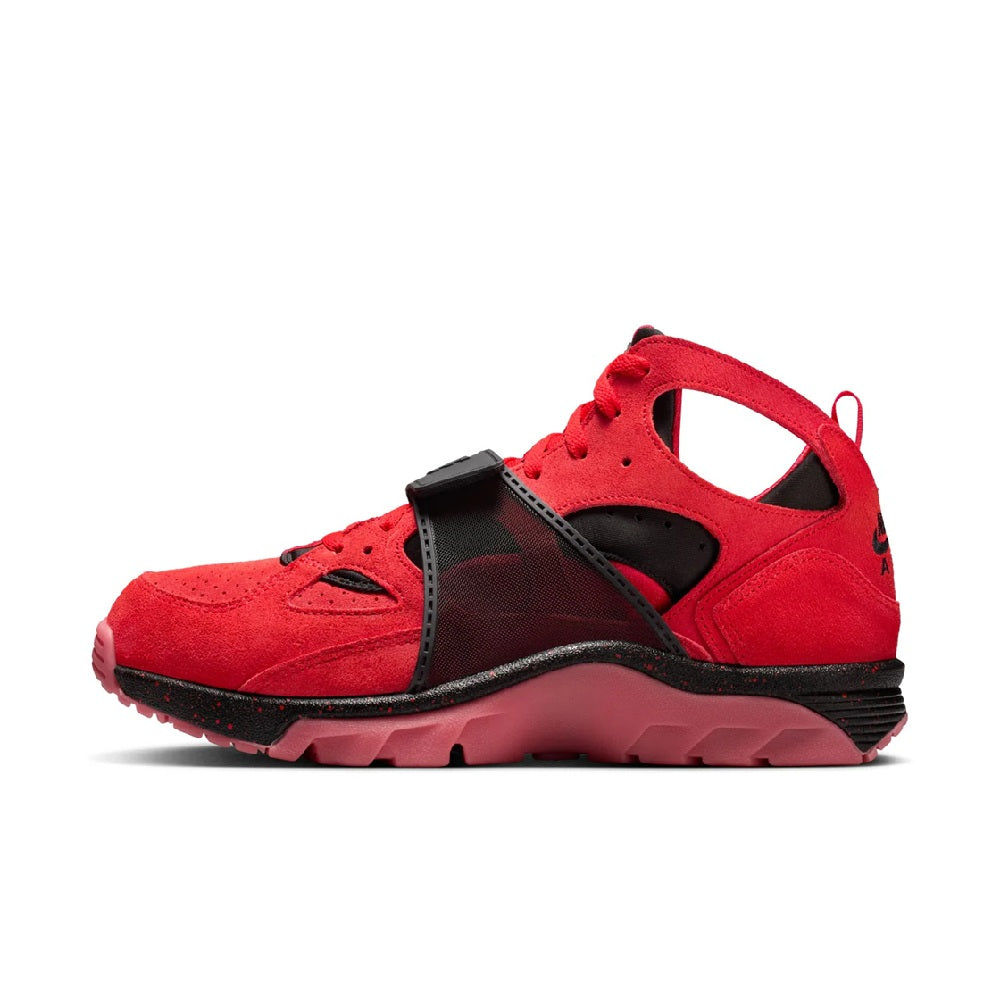 Red and black high-top Nike sneakers with suede uppers and black ankle strap