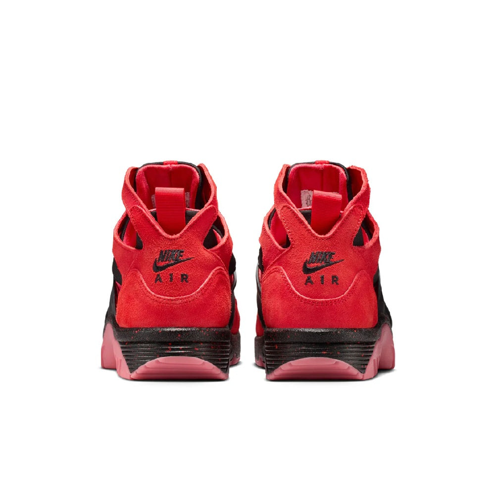 Red and black Nike sneakers showing heel with Nike Air logo and pink outsole
