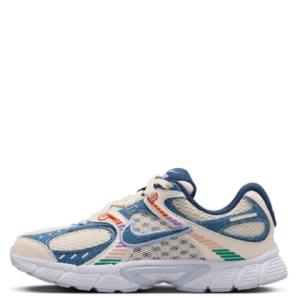 Kids' Nike lace-up sneakers with mesh panels and multicolor side stripes
