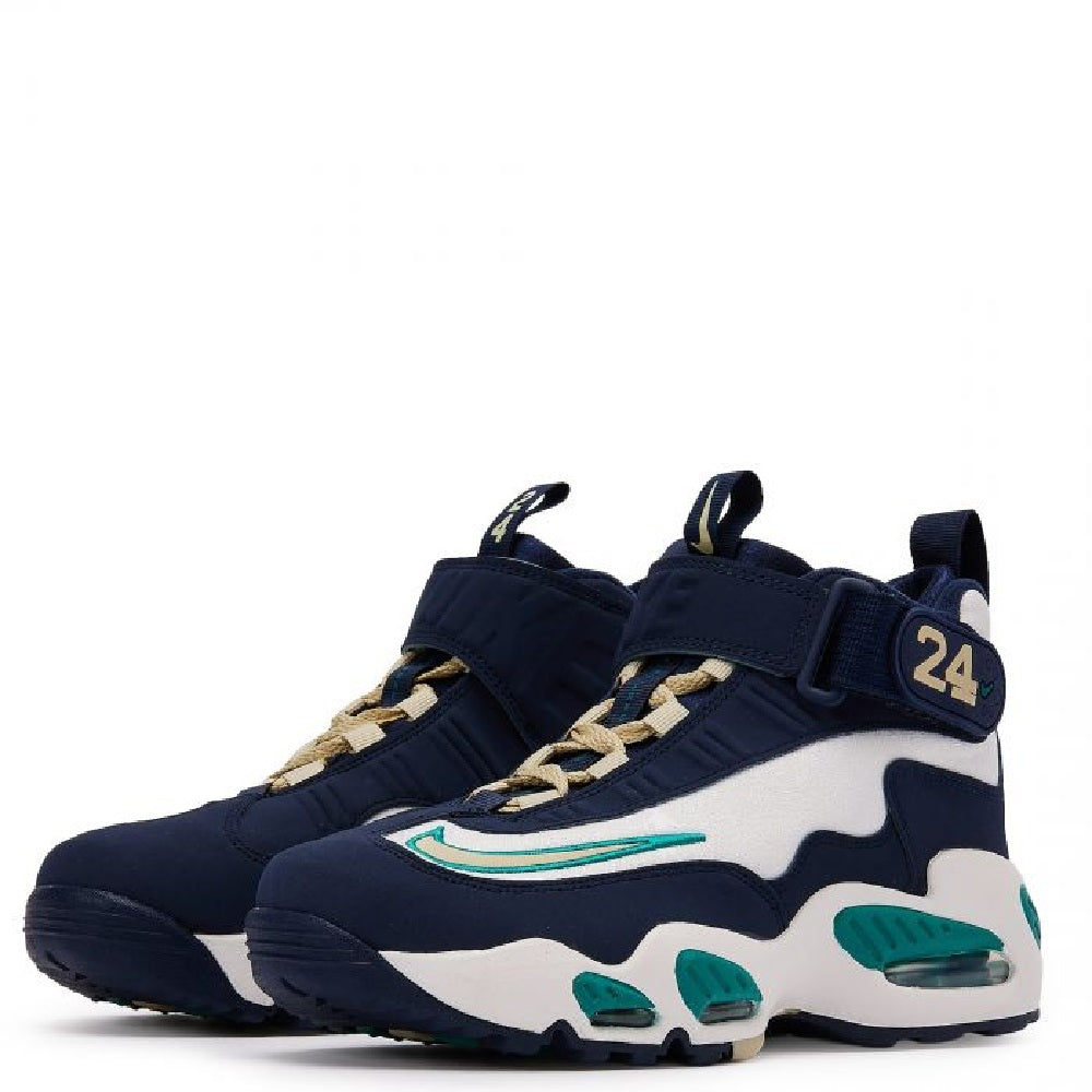 Kids' Nike high-top sneakers with navy upper, white panels, teal details, and gold laces