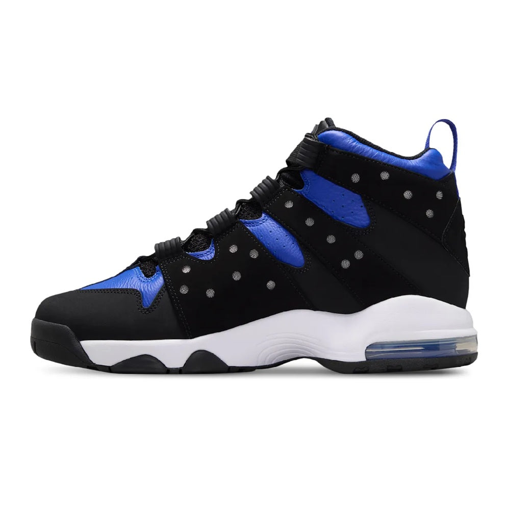 Men's black and blue high-top sneakers side view with white midsole and Air window