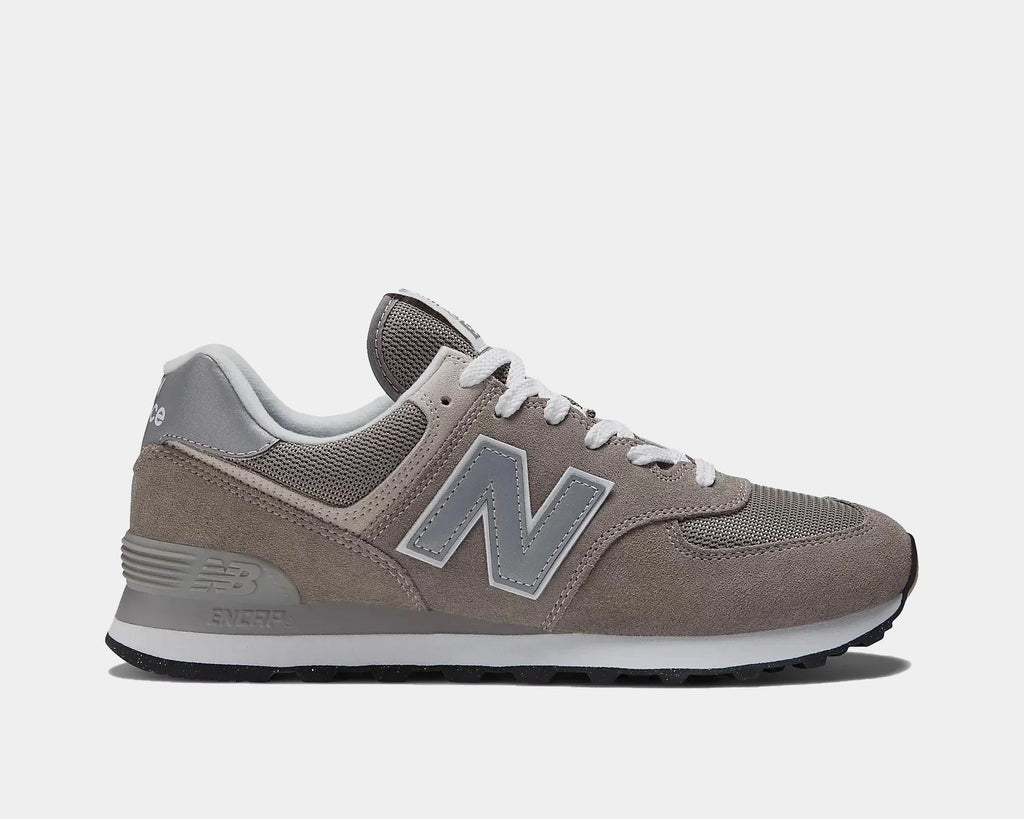 New Balance 574 sneakers in taupe/gray suede with gray laces, side view