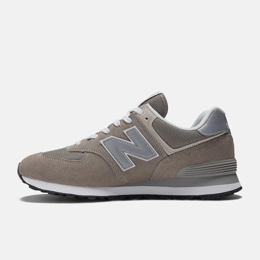 New Balance 574 sneakers in taupe suede with light gray midsole, side view