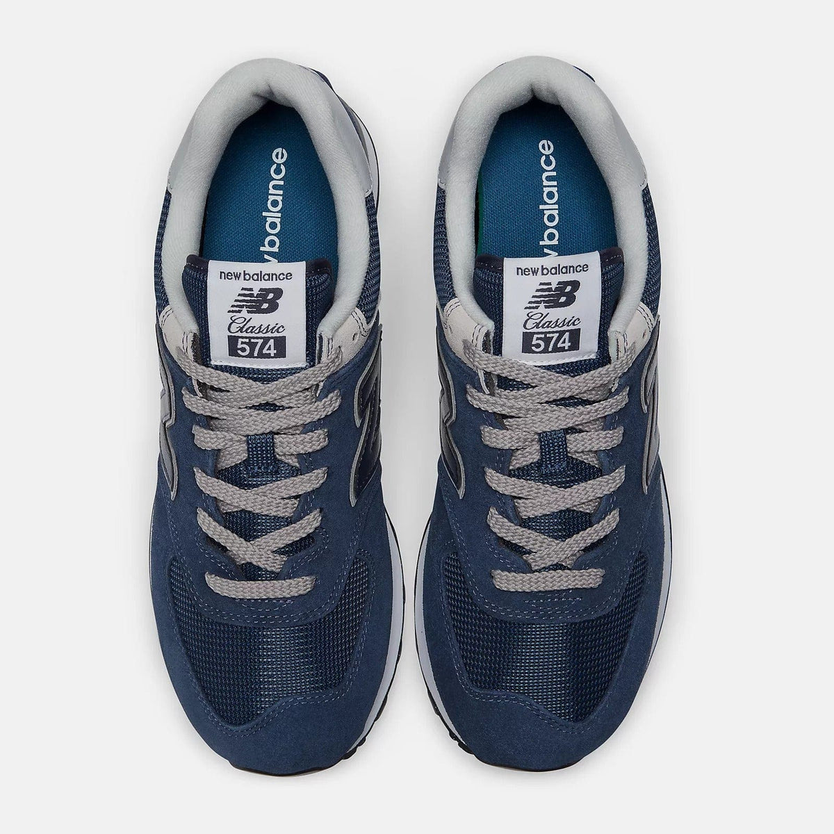 New Balance 574 sneakers, navy blue with cushioned tongue and Classic 574 heel label