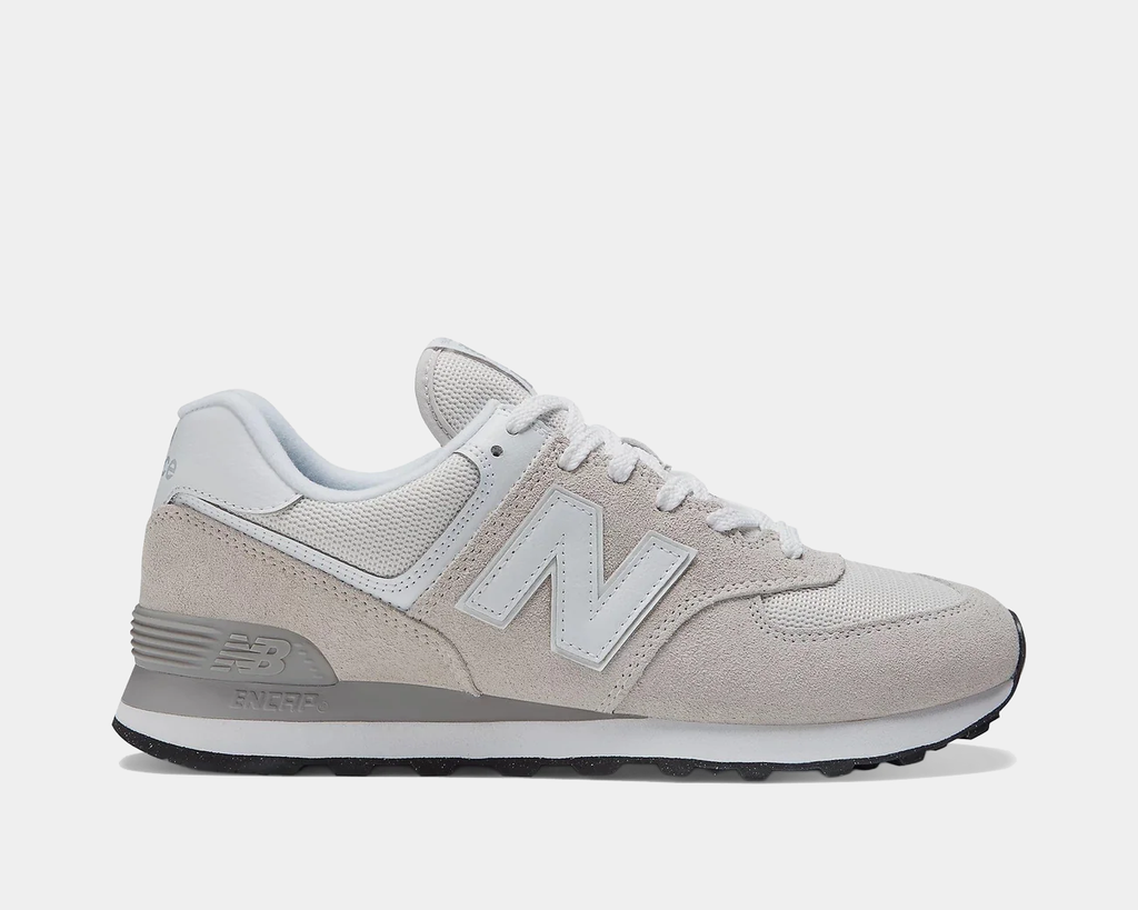 Light grey and beige lace-up sneakers with white N logo and rubber sole