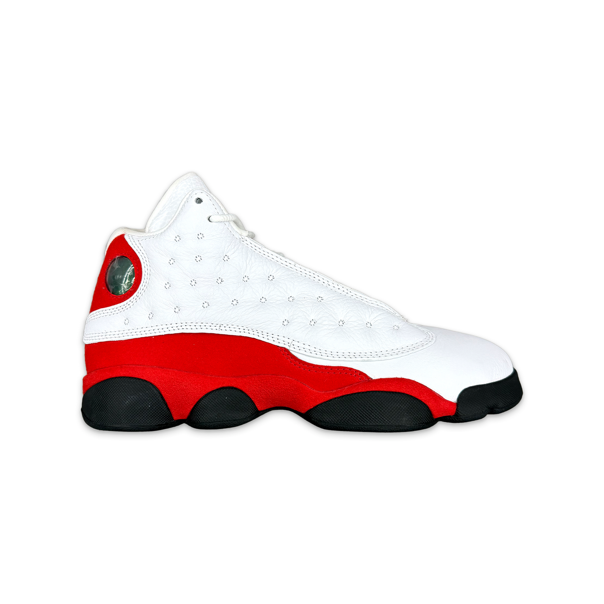 Kids Air Jordan 13 Retro sneaker in white, red and black with green eyelet detail