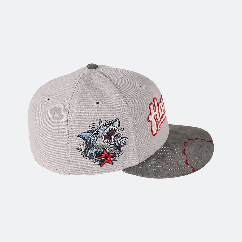Grey 59Fifty cap with dark brim featuring shark graphic and red Houston logo