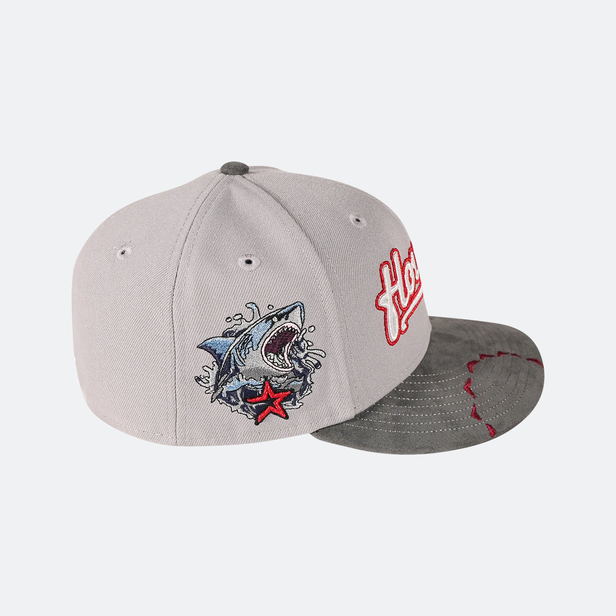 Grey 59Fifty cap with dark brim featuring shark graphic and red Houston logo