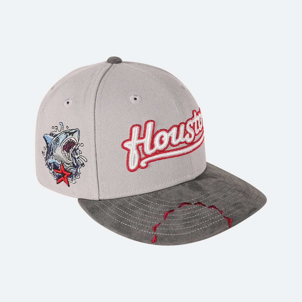Grey 59Fifty cap with dark brim, red Houston script logo and shark graphic