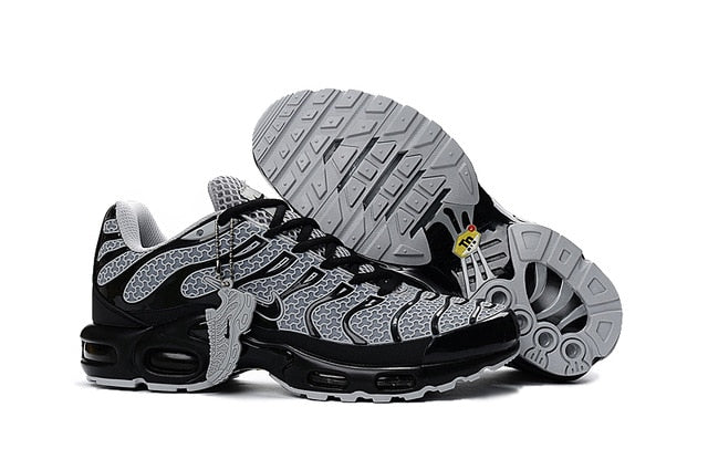 Nike Air Max TN running shoes, dark gray and black with light gray tread sole